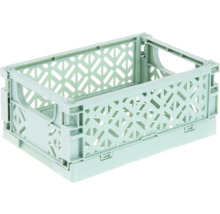 Klappbox aus Kunststoff in Hellgrün mit Gitterstruktur und seitlichen Grifföffnungen.