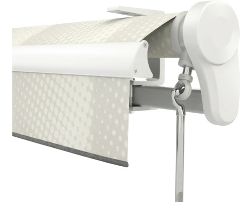 Kassettenrollo mit weißem Gehäuse, gemustertem Stoff und Kurbelanschluss.