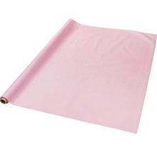 Rosa Tischläufer aus Papier auf einer Rolle.