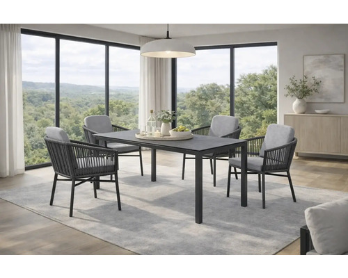 Moderner Essbereich mit dunklem rechteckigem Tisch und vier Armlehnstühlen mit Seilbespannung und grauen Polstern vor großen Fensterfronten.