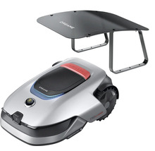 Mähroboter Dreame mit passender Garage, silbernes Gehäuse, schwarzes Dach, Wetterschutz.