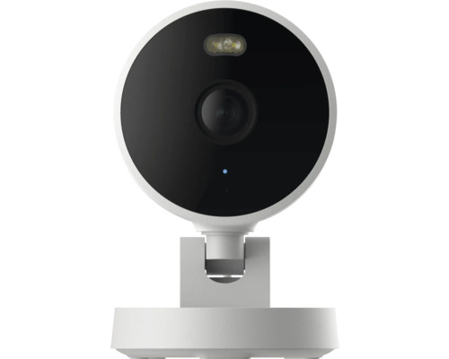 Moderne runde Überwachungskamera mit schwarzer Front und weißem Gehäuse auf einem Standfuß.