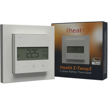 Heatit Z-Temp3 Z-Wave Batterie-Thermostat in Weiß mit LCD-Display und Bedientasten neben der Verpackung.