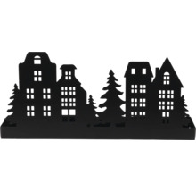 Schwarze Dekosilhouette aus Metall mit Häusern und Tannenbäumen.