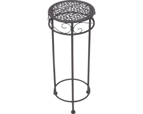Runder Blumenhocker aus Metall mit perforierter Abstellfläche und dekorativen Ornamenten.