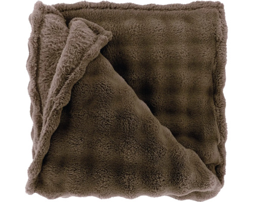 Flauschige Kuscheldecke aus Kunstfell in Braun.