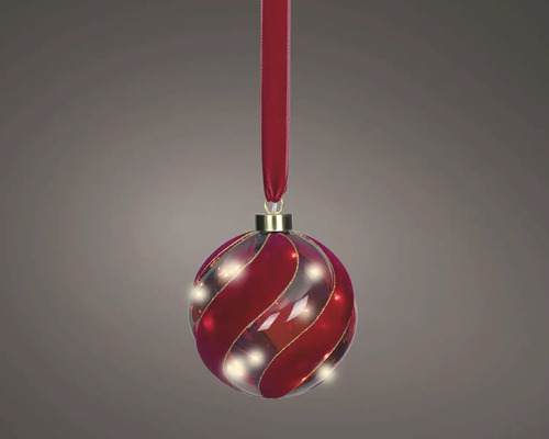 Beleuchtete Weihnachtskugel mit rotem Spiralmuster und Aufhängeband.