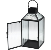 Laterne aus schwarzem Metall und geriffeltem Glas mit Tragegriff und offener Tür.