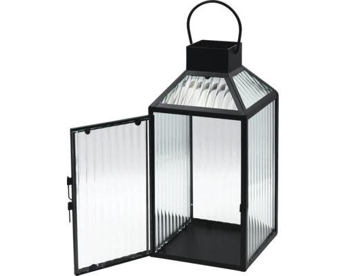 Laterne aus schwarzem Metall und geriffeltem Glas mit Tragegriff und offener Tür.