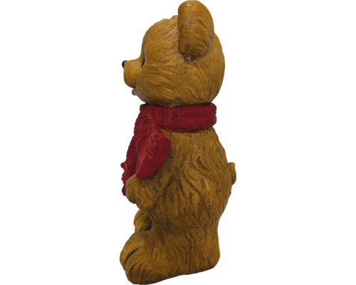 Dekorative Bärenfigur mit strukturierter Oberfläche und rotem Schal.