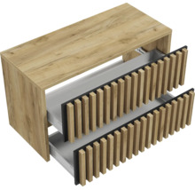 Waschtischunterschrank in Holzoptik mit zwei geöffneten Schubladen und Fronten im Lamellen-Design.