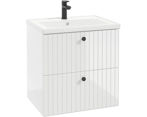 Weißer Waschbeckenunterschrank mit zwei Schubladen im Rillendesign, runden Knöpfen und weißem Waschtisch mit schwarzer Armatur.