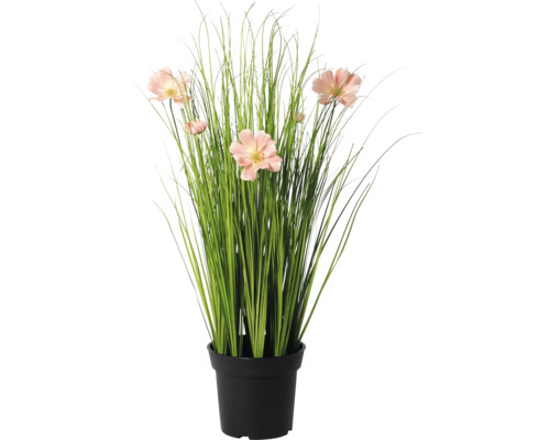 Künstliche Graspflanze mit rosa Blüten im schwarzen Topf.