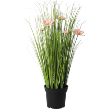 Künstliche Graspflanze mit rosa Blüten im schwarzen Topf.
