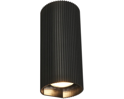 Zylindrische Wandleuchte mit gerippter Oberfläche und goldener Innenseite.