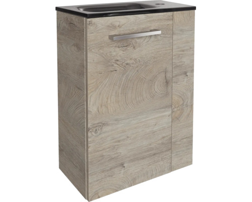 Moderner Waschbeckenunterschrank in Holzoptik mit silbernem Stangengriff und integriertem dunklem Waschbecken.