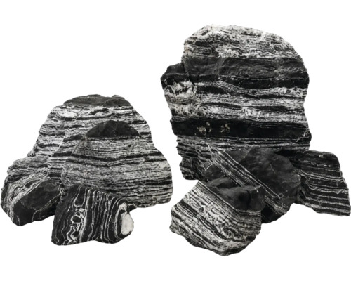 Mehrere dekorative Aquariumsteine mit markanter schwarz-weißer Streifung und natürlicher, rauer Textur in verschiedenen Größen.