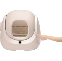 Selbstreinigende Katzentoilette aus Kunststoff in modernem Design mit Handbedienung am seitlichen Knopf.