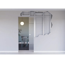 In der Wand laufende Glasschiebetür mit sichtbarer Metallständerwand und Trockenbau Konstruktion in einem modernen Wohnraum.