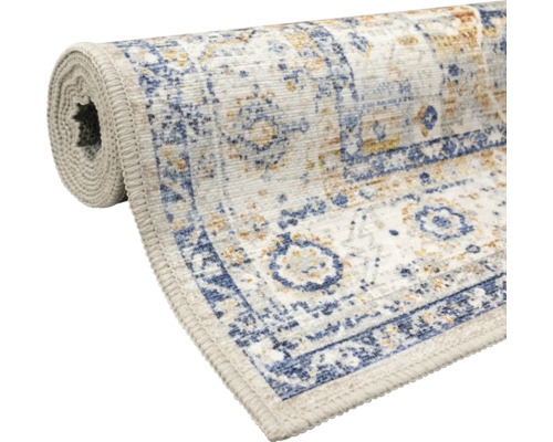 Teilgerollter Teppichläufer mit orientalischem Vintage-Muster in Blau und Beige, flachgewebt mit eingefassten Kanten.
