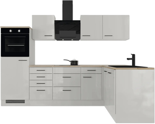 Moderne L-Küche mit weißen Fronten, schwarzen Elektrogeräten, Spüle und Arbeitsplatte in Holzoptik.