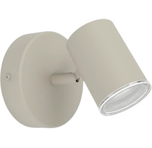 Verstellbarer Wandstrahler aus Metall in Beige mit zylindrischem Kopf und rundem Sockel für die Innenbeleuchtung.