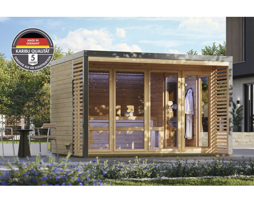 Moderne Karibu Gartensauna mit Glasfront und Holzlamellen auf einer Terrasse stehend mit Herstellergarantie und Made in Germany Siegel