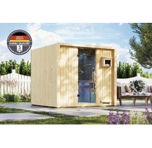 Gartensauna aus Holz mit Ganzglastür, stehend auf einer Terrasse in einem Garten mit Karibu Logo und Hinweis auf 5 Jahre Garantie.