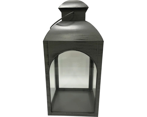 Laterne aus Metall mit Glaseinsätzen, gewölbtem Dach und Tragegriff in Antik-Optik.