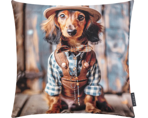 Kissen mit Fotodruck eines Dackels in bayerischer Tracht mit Hut, Fliege und Lederhose, Magma Logo.
