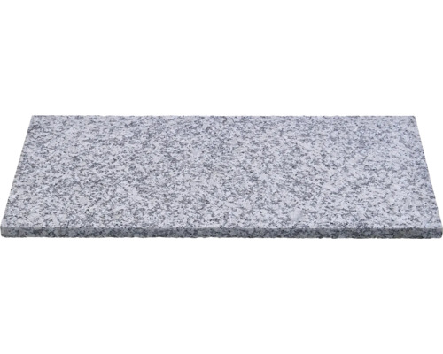 Rechteckige Granitplatte mit gesprenkelter Oberflächenstruktur.
