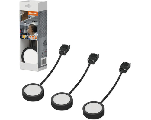 Ledvance Unterbauleuchte Spot Puck im Dreierset, runde LED Strahler für Schränke inklusive Kabel und Steckverbindern neben der Verpackung.