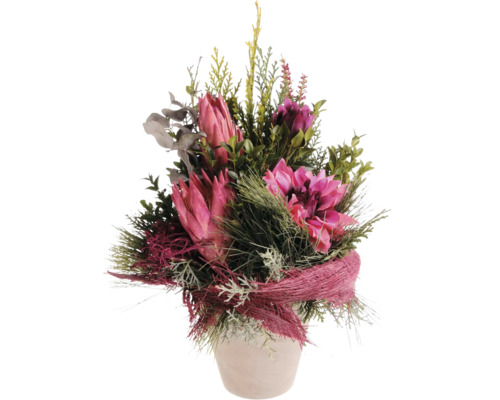 Künstlicher Blumenstrauß mit Proteen und Grünpflanzen in einem Blumentopf zur Dekoration.