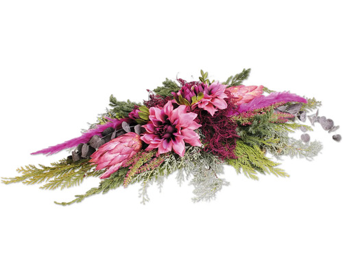 Künstliches Blumenarrangement mit Dahlien und Proteen sowie verschiedenen Grünpflanzen und Zweigen als dekorativer Tischschmuck