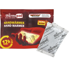 Thermopad Handwärmer mit 12 Stunden Wärmedauer in der Verpackung inklusive ausgepacktem Handwärmer.