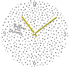 Wanduhr mit Punkten und dem Schriftzug Folge deinen Träumen