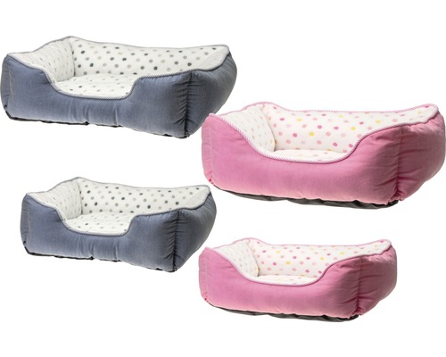 Mehrere gepolsterte Hundebetten mit Punktmuster