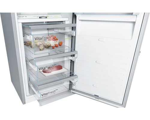 Geöffneter Kühlschrank mit mehreren VitaFresh Schubladen, gefüllt mit Gemüse, Obst und Fleisch