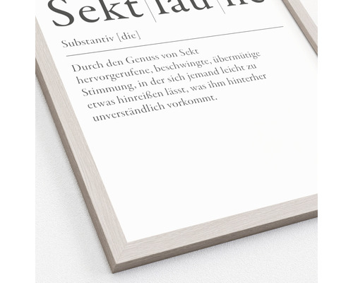 Gerahmtes Bild mit der Definition des Wortes Sekt.