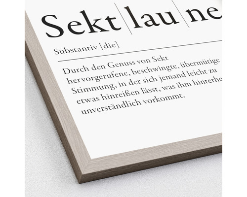 Gerahmtes Bild mit der Definition des Wortes Sektlaune