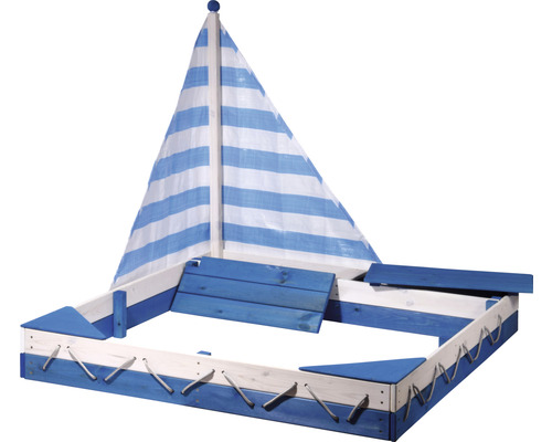 Sandkasten in Form eines Schiffes mit Segel