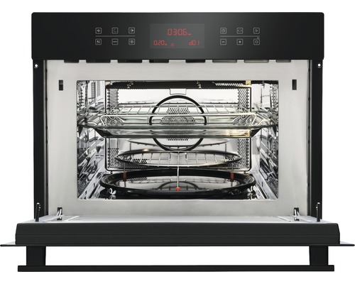 Geöffneter Mikrowellenofen mit Drehteller und Grill