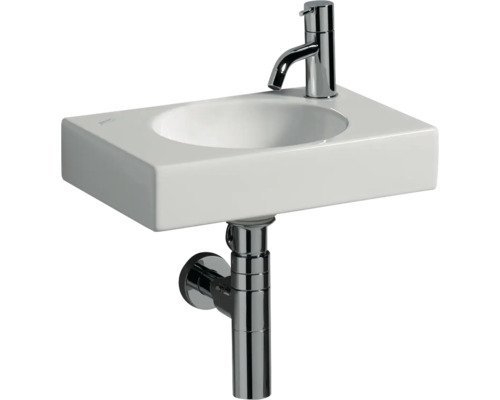 Keramikwaschbecken mit Armatur und Siphon
