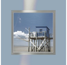 Gerahmtes Bild mit einem Fischerhaus am Meer