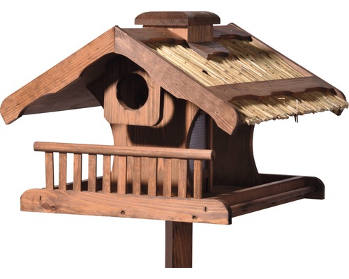 Vogelhaus aus Holz mit Strohdach