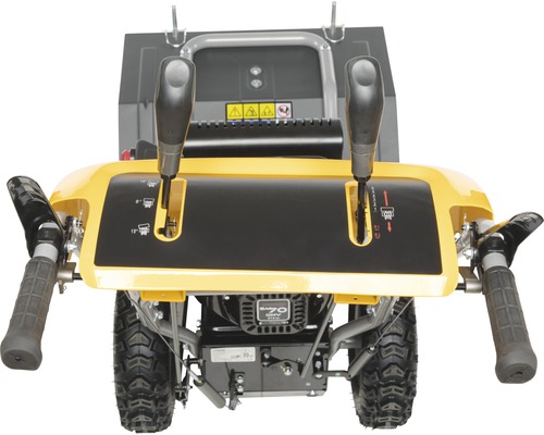 Detailansicht einer Schneefräse mit Bedienhebeln und Reifen