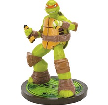 Michelangelo Teenage Mutant Ninja Turtle Figur mit Nunchakus auf Kanaldeckel