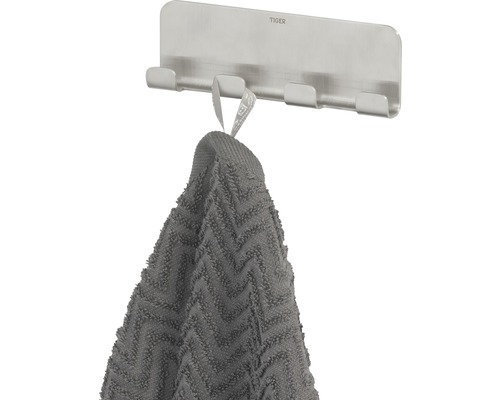 Tiger Handtuchhalter mit einem Handtuch