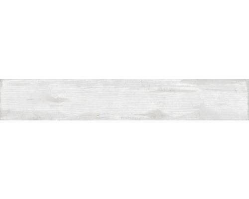 Weiße Wandfliese in Holzoptik.