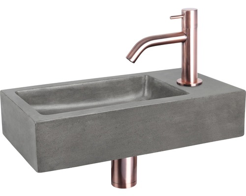 Graues Betonwaschbecken mit Armatur